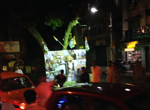 A collage of photographs greets us at the Tollygunge rally.